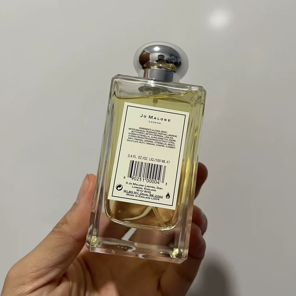 Jo Malone Lime Basil & Mandarin bottle photographed from our own stock, batch code W1U SHQ